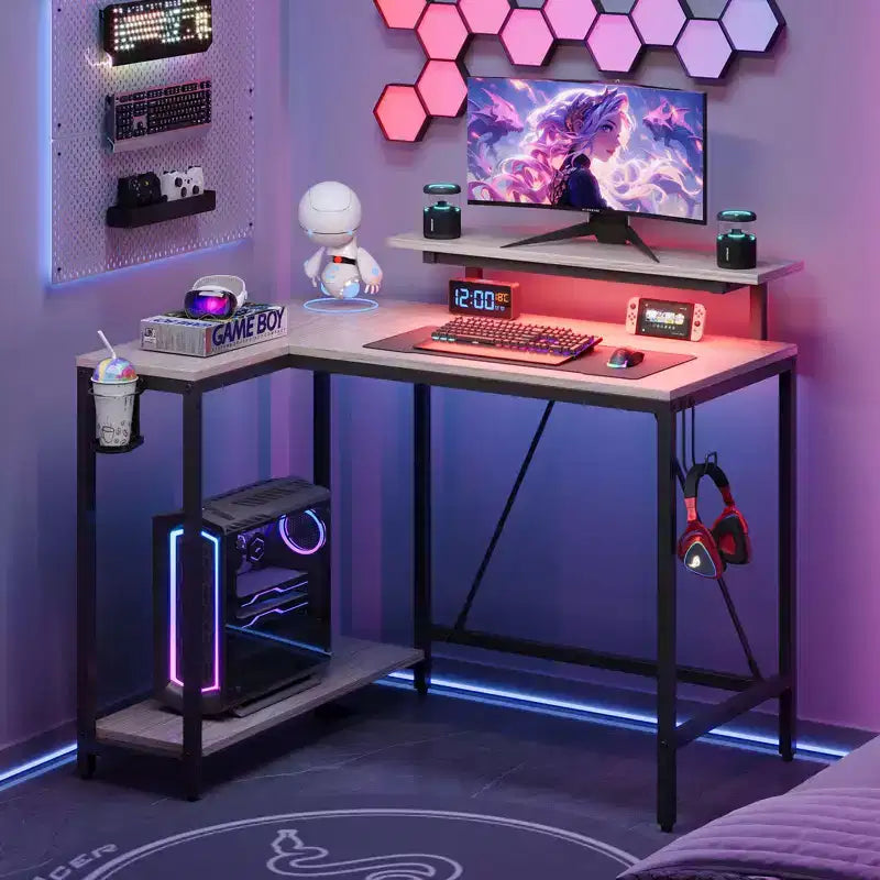 Bureau gaming en forme de L réversible de 42 pouces avec support d'écran, lumières LED, crochet pour casque et étagères de rangement, bureau de télétravail